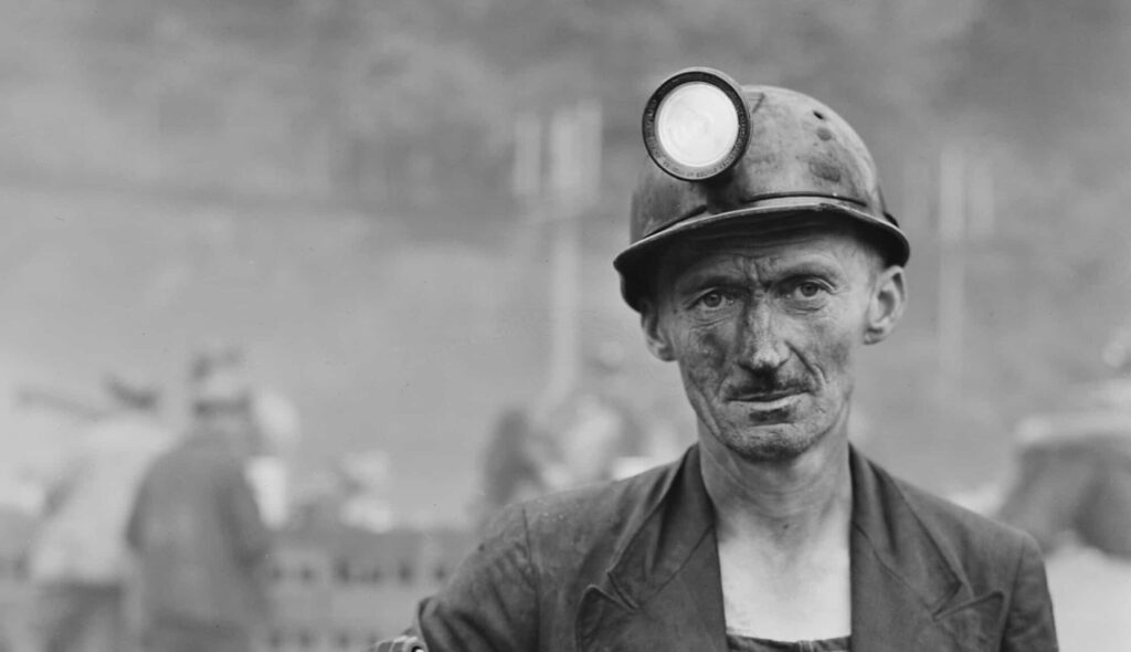 Harry_Fain,_coal_loader._Inland_Steel_Company,_Wheelwright_^1_&_2_Mines,_Wheelwright,_Floyd_County,_Kentucky._-_NARA_-_541452_-_cropped_and_restored 1